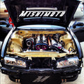 Mishimoto Universal Silver R Line Intercooler Overall Size: 31x12x4 Core Size: 24x12x4 Inlet /Outlet